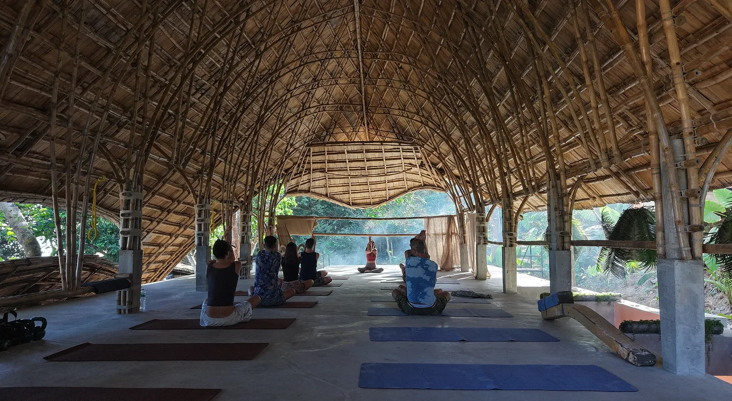 A yoga session in the open-air wellness hall at Taran
